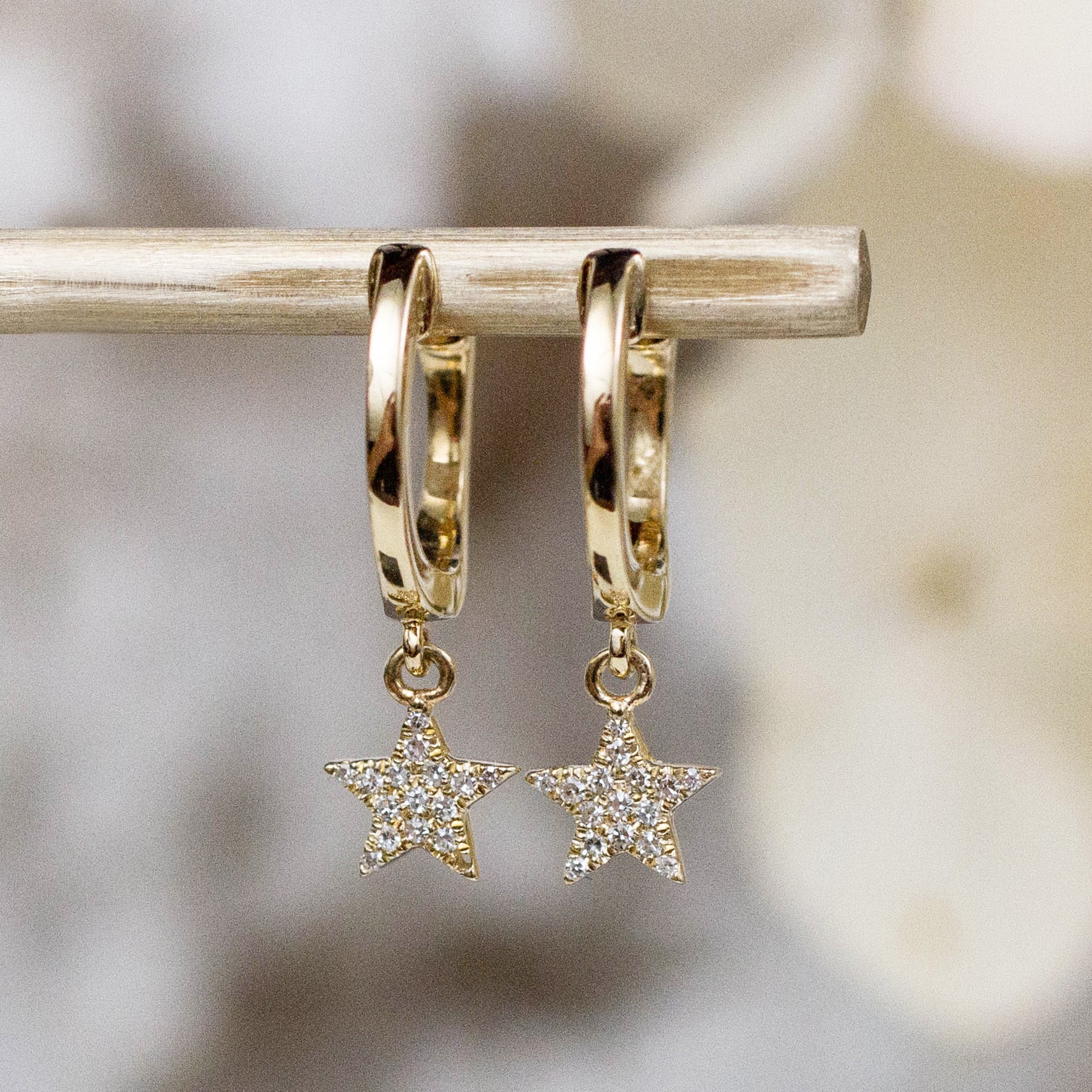 Tiny Star Charm Huggie Hoop Earrings in Gold | Lisa Angel